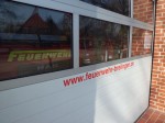 Die LF 10/6 Garage mit Hinweis...